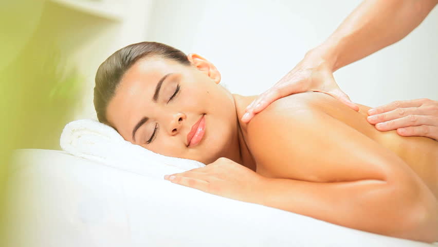 Beautiful Girl Receiving Body Massage Therapy Stock