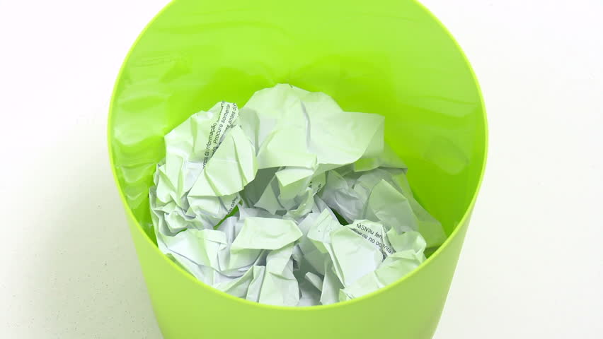 Clip 03 Of A Clock Falling Inside Of An Office Trash Can Meaning