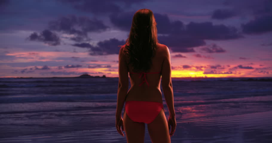 Woman On The Beach In Sunset - Nude Silhouette Stock 
