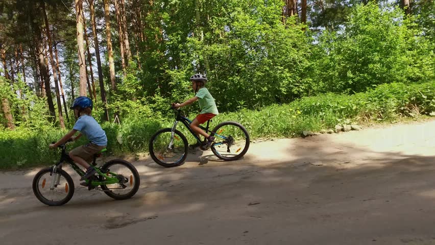 boys riding bikes
