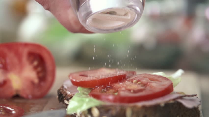 Hand Sprinkle Salt On Sandwich Slow Motion Shot At 480fps Stock Footage Video 2978788 