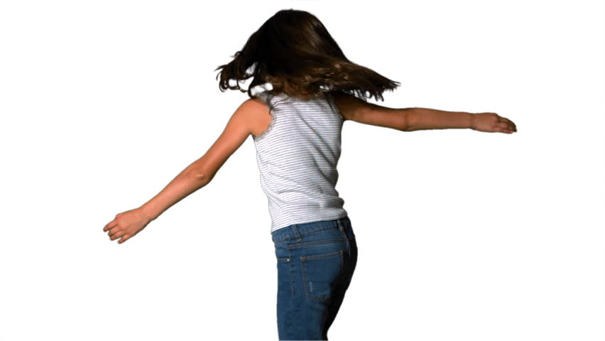 Little Girl Spinning Around On White Background In Slow Motion Stock