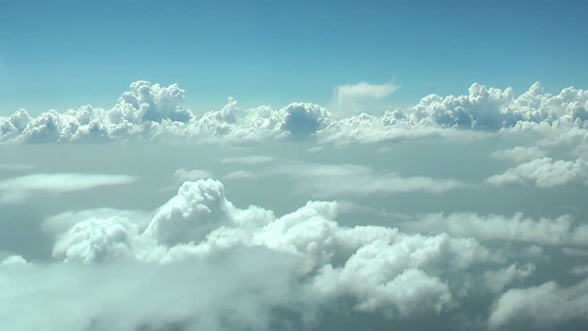 Flying Through White Clouds At Daytime Seamless Loop.. Extreme High