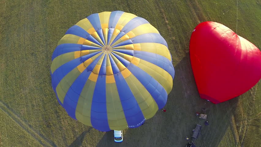 Two Hot Air Balloon On The Ground Preparing For Take-off. Top View ...