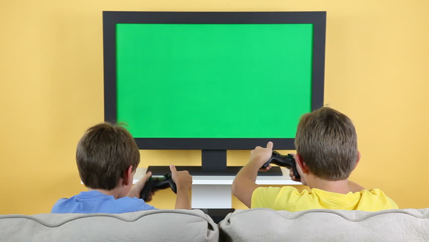 two-young-boys-playing-video-games-at-home-on-a-flat-screen-television