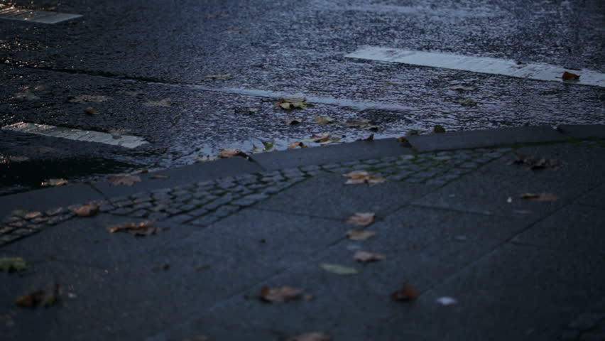 Busy Street Junction On A Rainy Day Wet Asphalt, Light Reflections