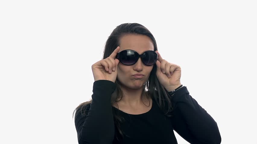 Attractive Young Woman Winking Behind Sunglasses. Brown ...