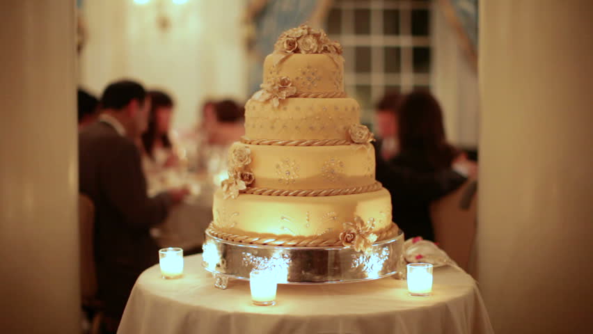 A Golden Wedding Cake At Left Shot With Shallow Depth Of ...