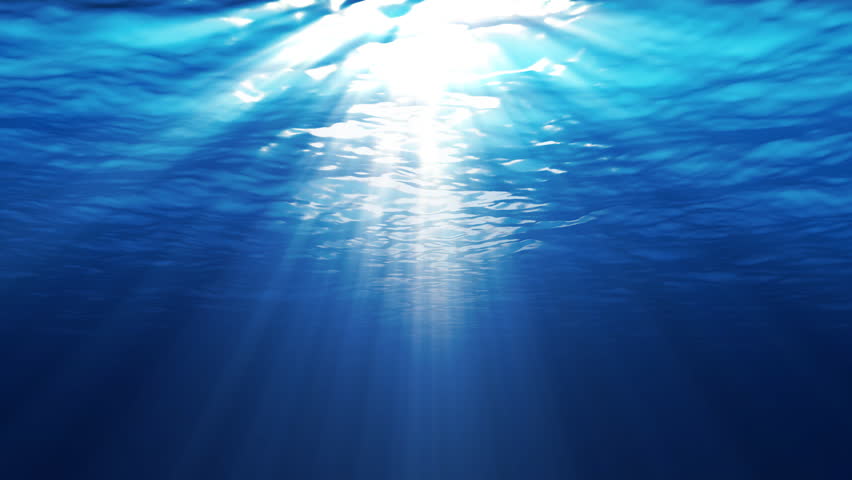 Underwater Scene With Sunrays Shining Through The Water's Surface Stock 