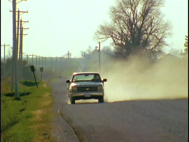 A Pickup Truck Drives Down A Dirt Road. Stock Footage Video 1384573 ...