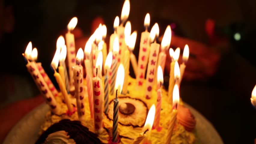 Happy Birthday Cake With Burning Spiral Candles Which Are Then ...