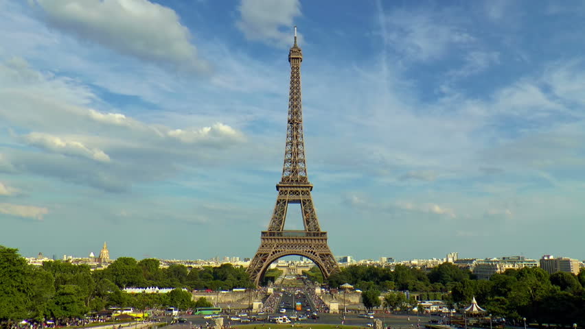 View Of Eiffel Tower From Far Away In Paris France With Moving Clouds ...