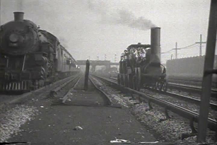 1920s - People Ride An Antiquated Train On A Railway Track In 1922 ...