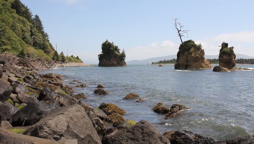 Tillamook Bay In Garibaldi Oregon Rocky Beach At Lowtide With Waves And ...