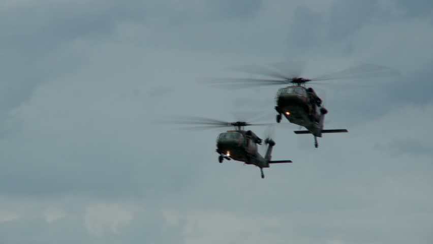 Two Blackhawk Helicopters Fly In Formation Stock Footage Video 513103 ...