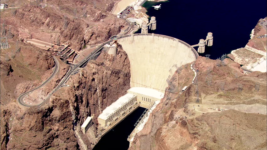 Hoover Dam Water Mountains. Aerial shot of the Hoover Dam. Steep ...