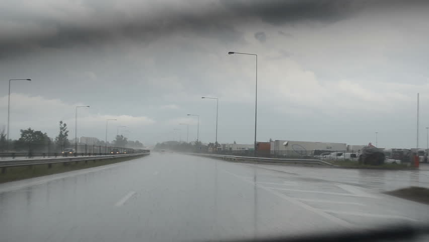 Rain Water River On Highway Road And Cars Driving In Danger Weather ...