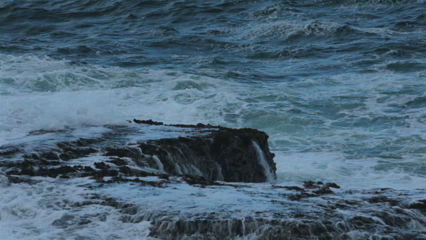 Ocean waves rough surf on rugged rocks shoreline. Rough Caribbean and ...