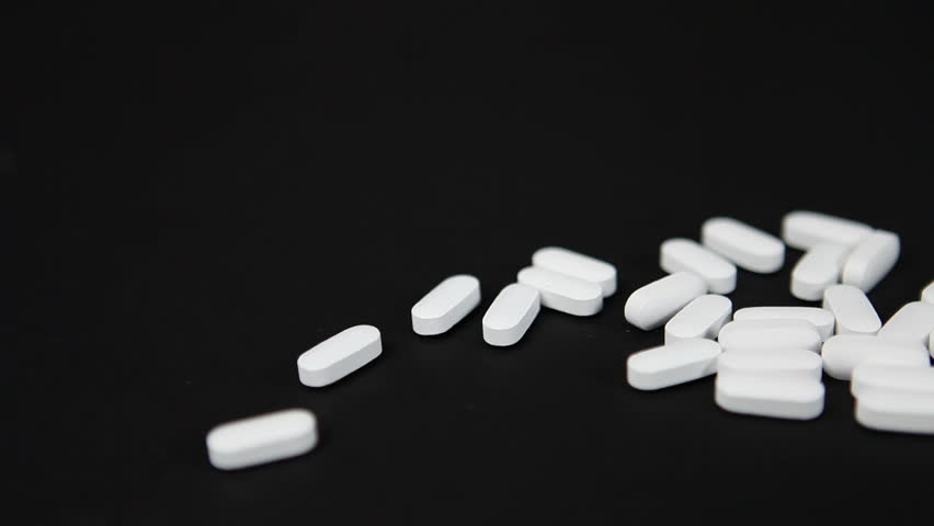 White Pills On Black, Curved Move Stock Footage Video 566860 - Shutterstock