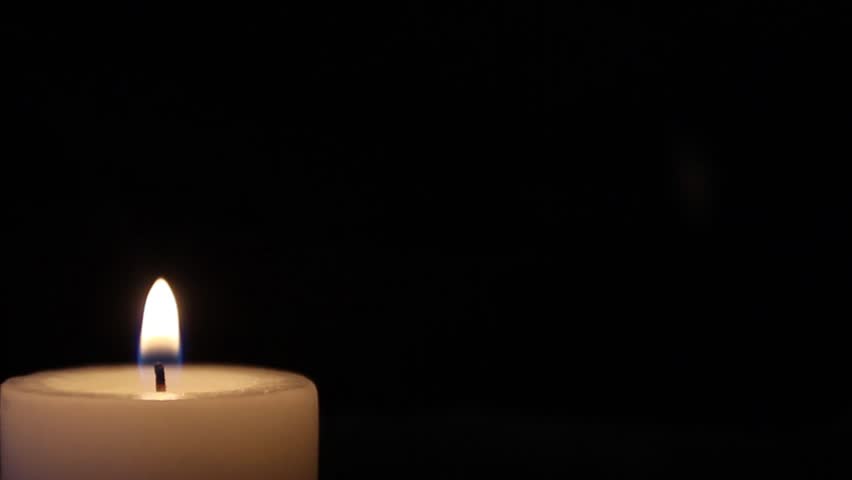 Shot Of A Candle Burning At The Left Corner, Isolated On Black ...