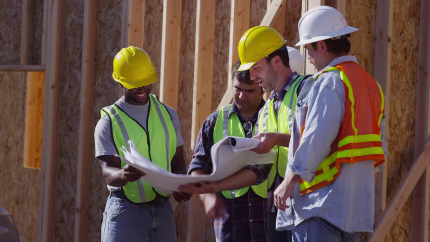 Group Of Construction Workers Look At Plans Stock Footage Video 7290397 ...