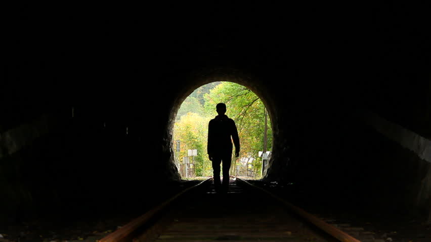 Man Walking To Light End Of Tunnel, Search Of Hope Stock Footage Video ... Silhouette Man Walking Tunnel