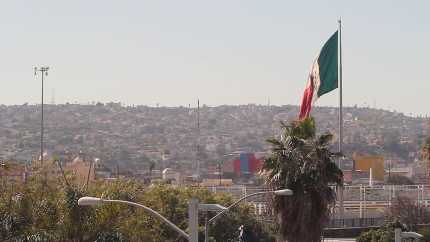 The Mexican Flag Hanging Above The Border Between San Diego And Tijuana ...