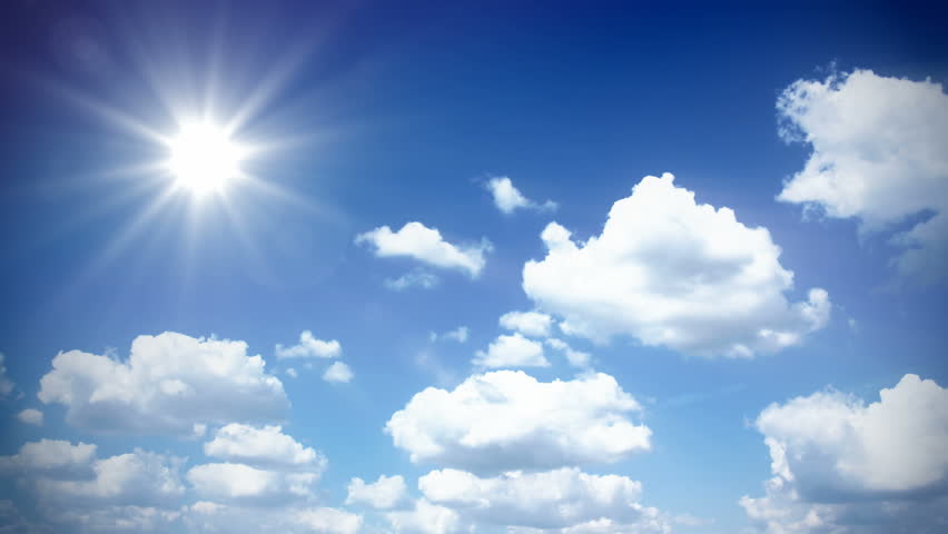 White Clouds Flying On Blue Sky With Sun Rays - Time-lapse Motion ...